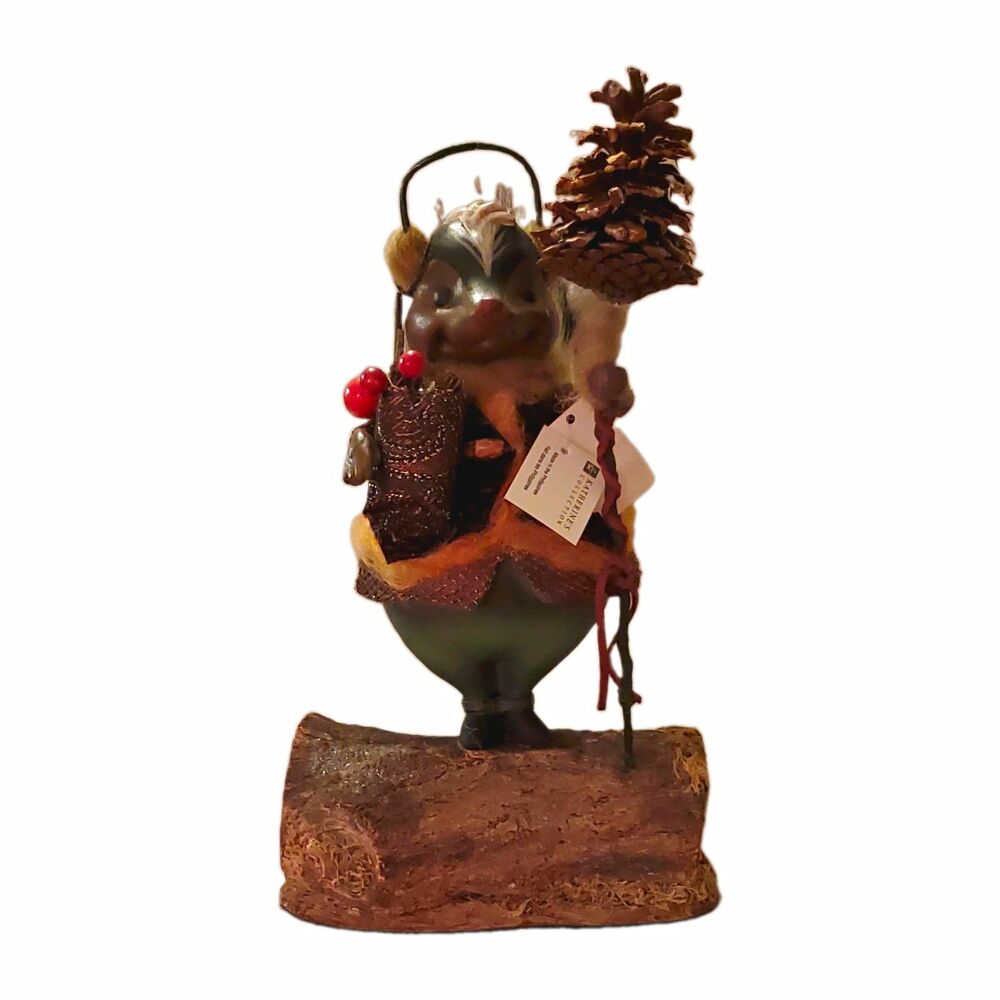 Kathleen's Collection Skunk Figurine on Log Base Pinecone Red Berries 11"